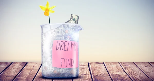 Can of money and dreams fund message — Stock Photo, Image