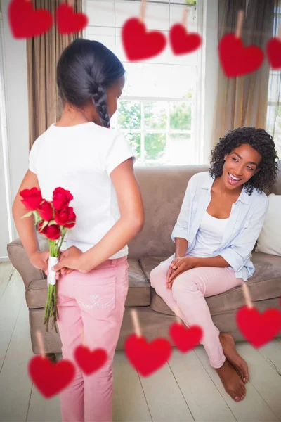 Daughter giving roses to mother — Stock Photo, Image