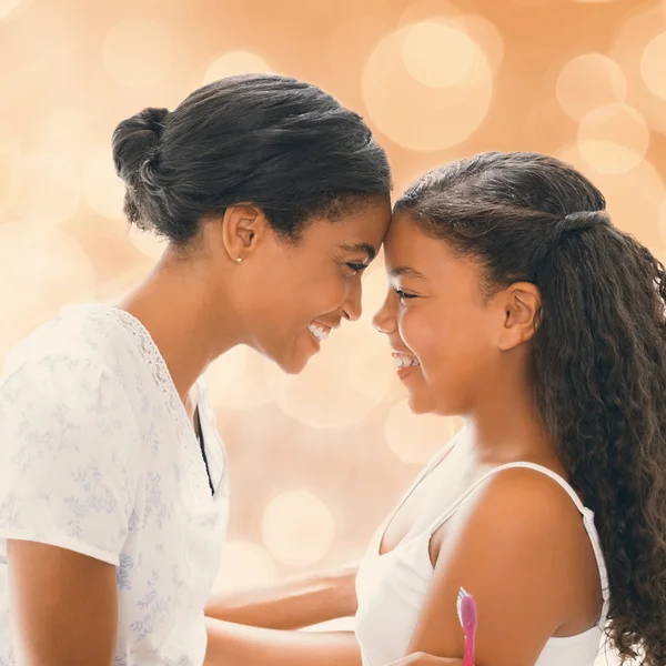 Mother and daughter holding each other — Stock Photo, Image
