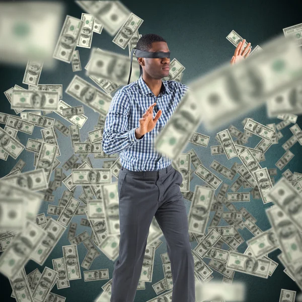 Blindfolded businessman with arms out — Stock Photo, Image