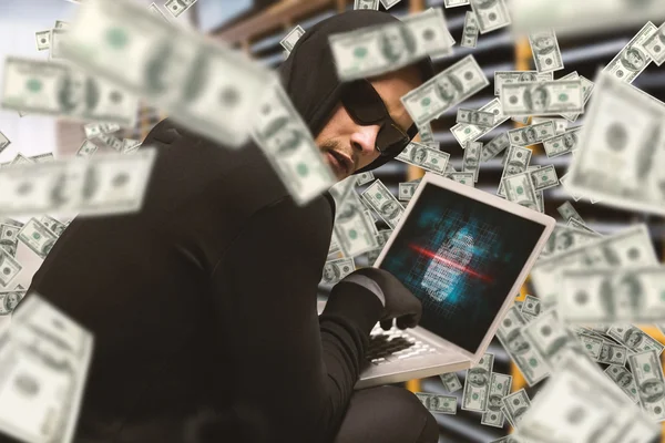 Hacker using laptop to steal identity — Stock Photo, Image