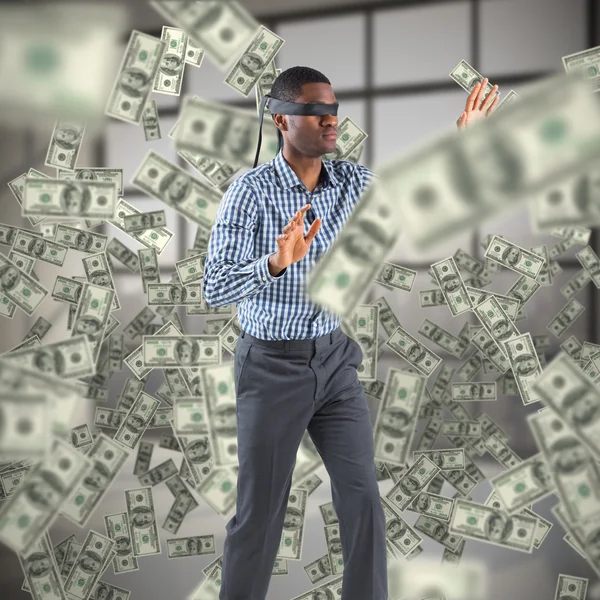 Blindfolded businessman with arms out — Stock Photo, Image