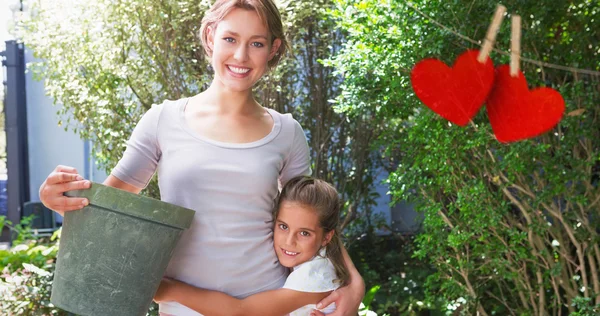 Mother and daughter holding each other — Stock Photo, Image