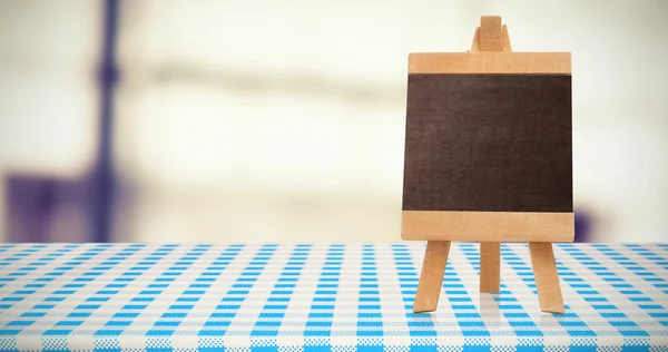 Tablecloth with standing blank agenda — Stock Photo, Image