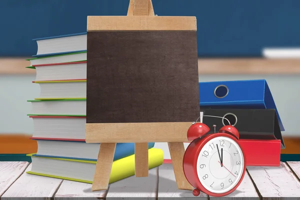 School objects on pile of books — Stock Photo, Image