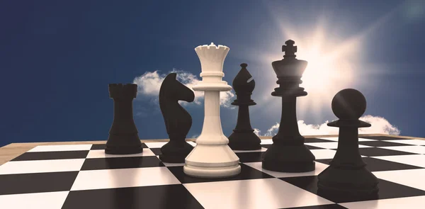 White queen standing with black chess pieces — Stock Photo, Image