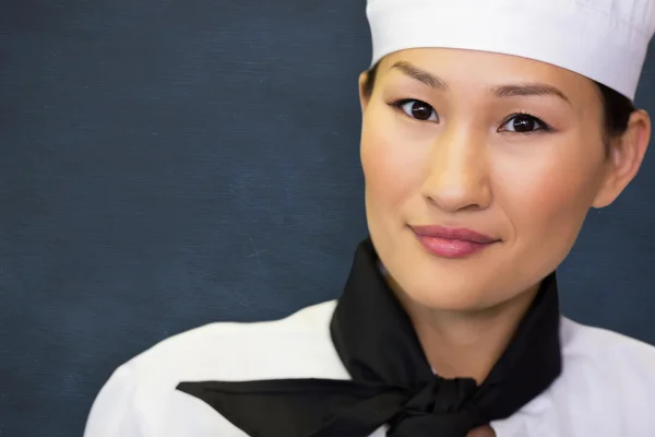 Closeup portrait of a smiling female cook — Stock Photo, Image