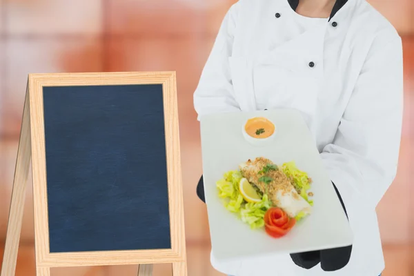 Female chef offering healthy food — Stock Photo, Image