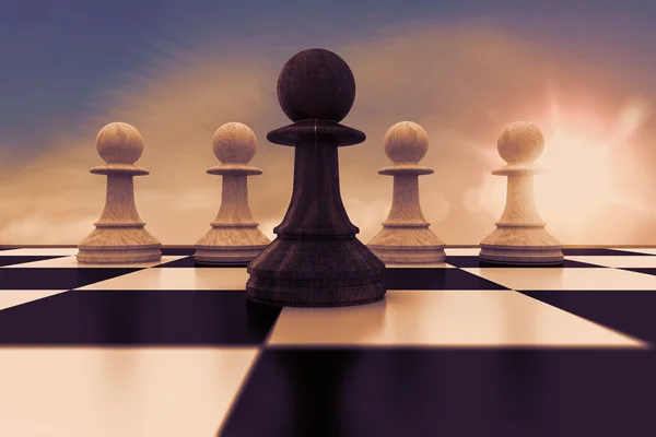 Black pawn in front of white pawns — Stock Photo, Image