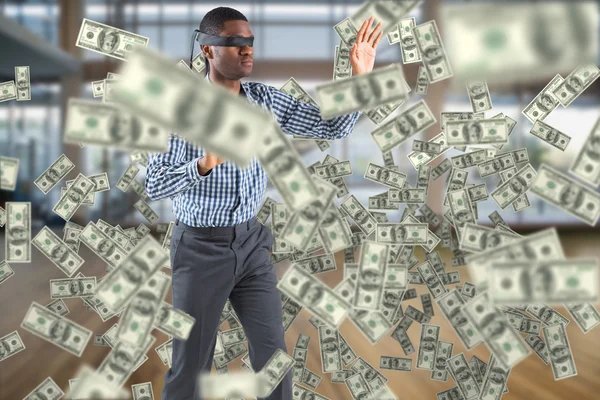 Blindfolded businessman with arms out — Stock Photo, Image