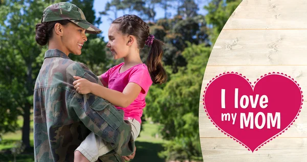 Army woman carrying daughter — Stock Photo, Image