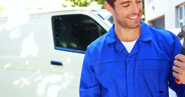 Repairman with tools and thumbs up — Stock Video