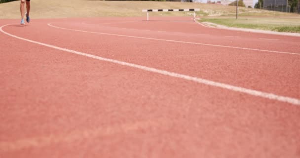 Sportsperson running on running track — Stock Video