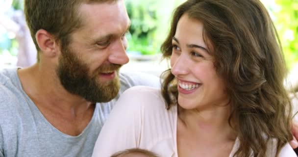 Pais com bebê em suas mãos — Vídeo de Stock