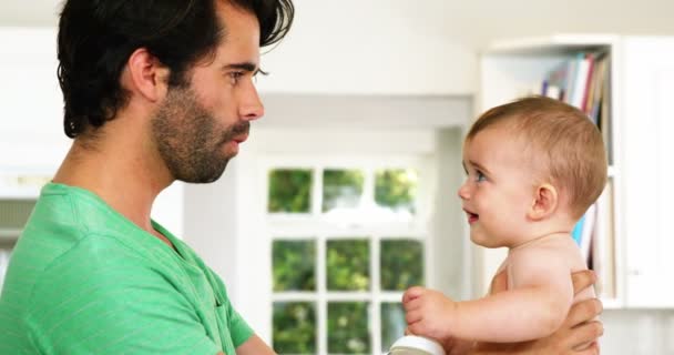 Happy father playing with his baby — Stock Video