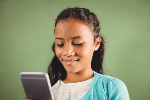 Girl using a smartphone — Stock Photo, Image