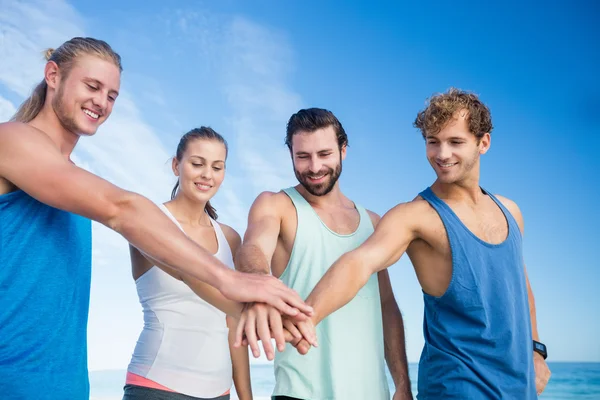 Friends putting their hands together — Stock Photo, Image