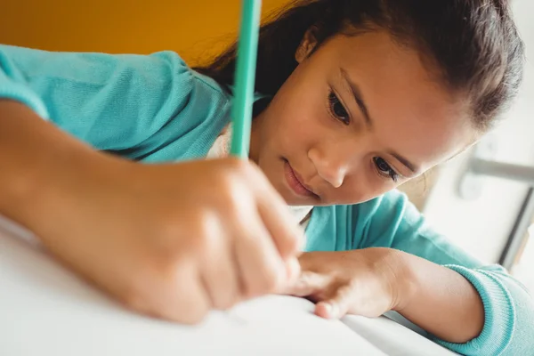 Girl writing in her notebook — Stock Photo, Image