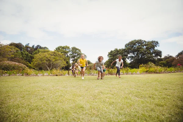 Children smiling and running — Stock Photo, Image