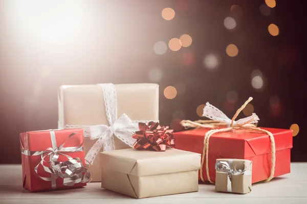 Composite image of presents on table — Stock Photo, Image