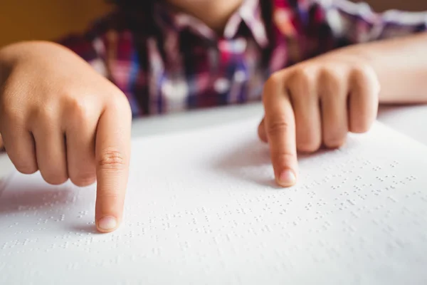 Boy using braille to read — Stock Photo, Image