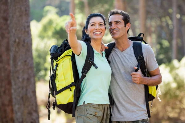 Couple pointing and hiking — Stock Photo, Image