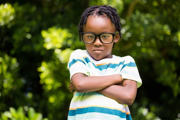 A kid posing with his arms crossed — Stock Photo, Image