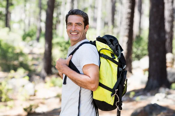 Man smiling and posing with his backpack — Stock Photo, Image