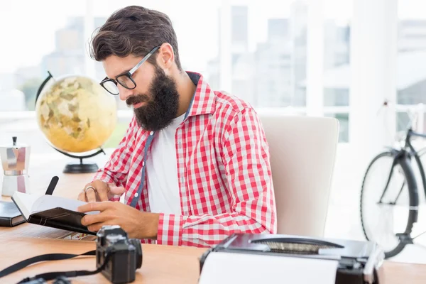 Hipster man reading his notes — Stock Photo, Image