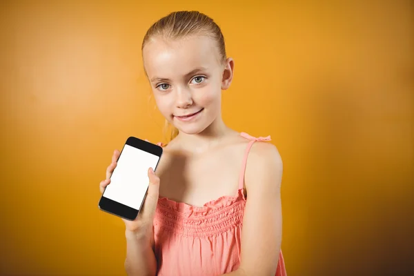 Girl showing to the camera her smartphone Stock Image