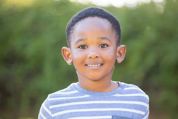 Boy standing in the park — Stock Photo, Image