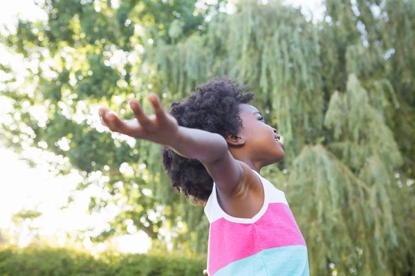 Child with arms outstretched — Stock Photo, Image