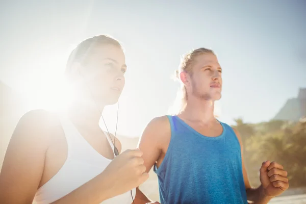 Couple running together — Stock Photo, Image