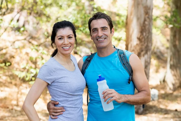 Portrait of a couple smiling and holding each other — Stock Photo, Image