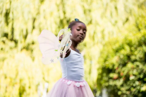 Cute mixed-race girl wearing a fairy dress — Stock Photo, Image