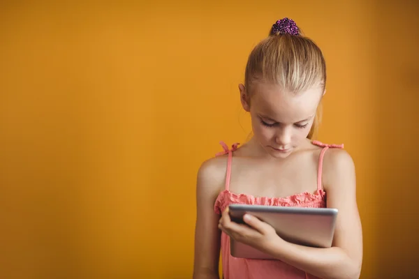 Little girl using a tablet — Stock Photo, Image