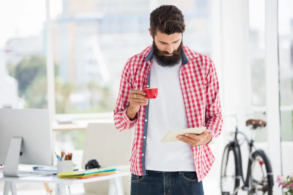 Hipster man looking on his notes — Stock Photo, Image