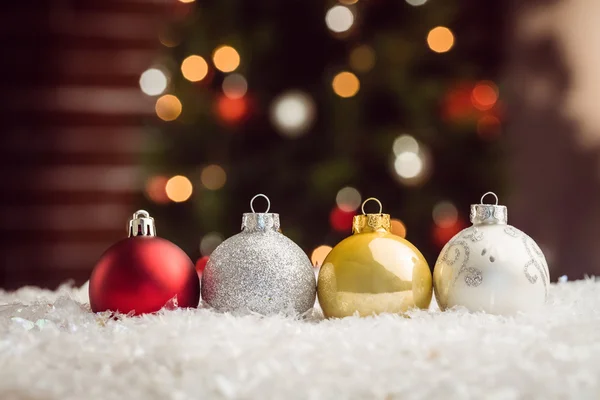 Composite image of Christmas baubles lined up — Stock Photo, Image