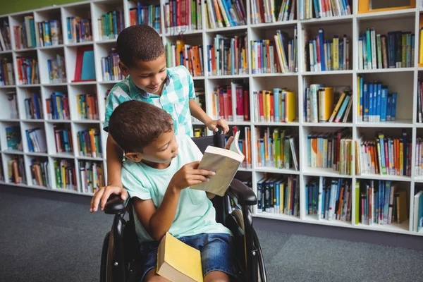 Little boys holding books — Stock Photo, Image