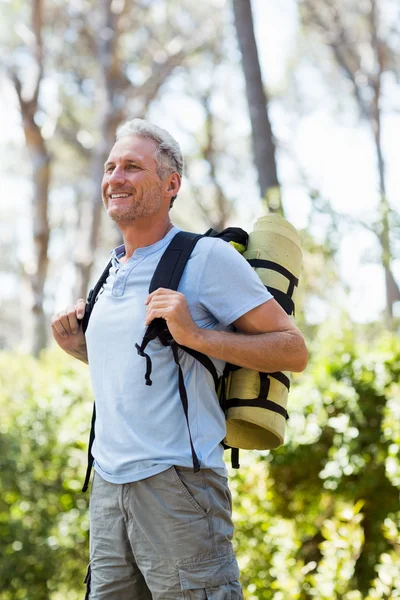 Man smiling and posing with his backpack — Stock Photo, Image