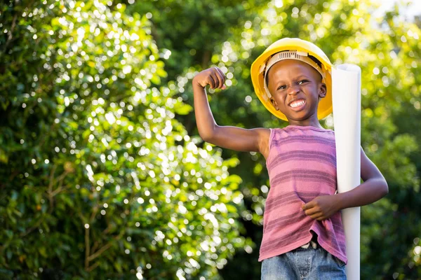 Boy is wearinf a hardhat — Stock Photo, Image