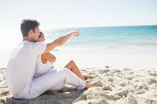 Cute couple sitting down — Stock Photo, Image