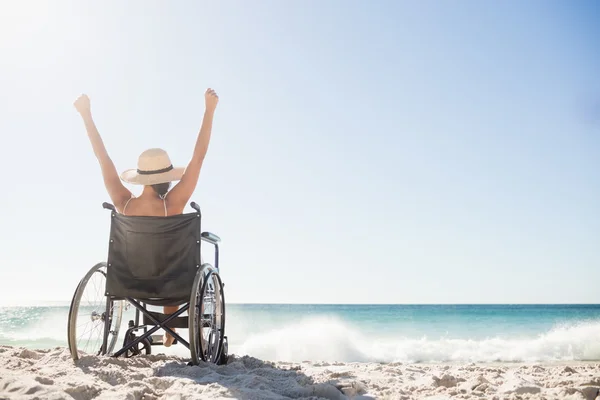 Wheelchair woman sitting  with arms up — Stock Photo, Image