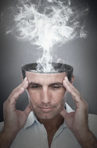 Handsome man thinking with hand on forehead — Stock Photo, Image