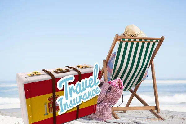 Travel insurance message on a spanish suitcase — Stock Photo, Image