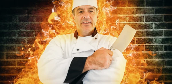 Ritratto di uno chef serio con un coltello in mano — Foto Stock