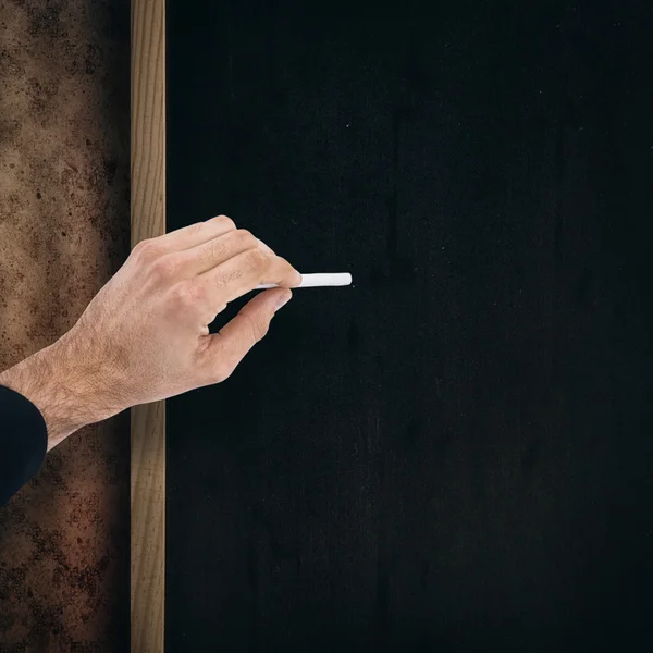 Χέρι ενός επιχειρηματία γράφοντας με μια άσπρη κιμωλία — Φωτογραφία Αρχείου