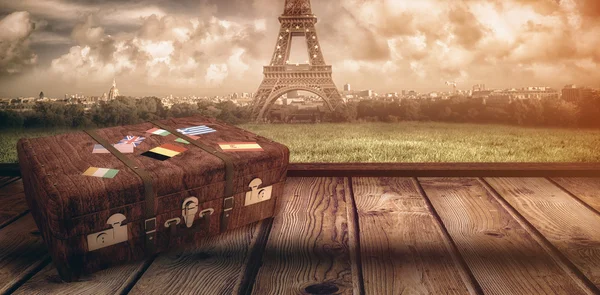 Composite image of suitcase with stickers — Stock Photo, Image