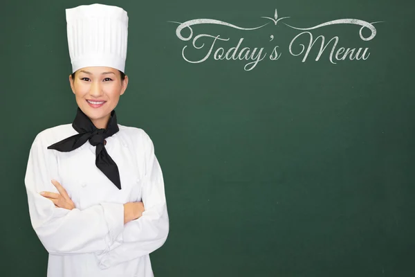 Composite image of woman chef smiling — Stock Photo, Image