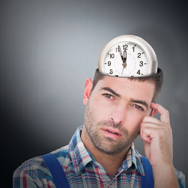 Manual worker scratching head — Stock Photo, Image